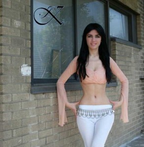 Jennifer Kaya fashion design: beige top with white pants