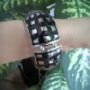 Elegant Black and Metal Combo Bracelet With Unique Flowers Design